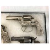 VIEW 2 CLOSEUP EARLY CAP PISTOLS
