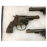 VIEW 2 CLOSEUP EARLY CAP PISTOLS