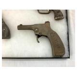 VIEW 2 CLOSEUP EARLY CAP PISTOLS