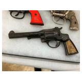 VIEW 2 CLOSEUP EARLY CAP PISTOLS
