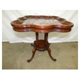 UNUSUAL CHOC. MARBLE TOP TABLE