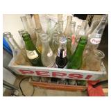 CLOSEUP SODA CRATES AND BOTTLES