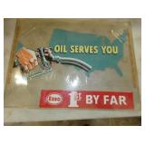 OIL SERVES YOU BY FAR ESSO