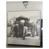 FRAMED MEN W/ AUTOMOBILE
