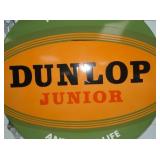 CLOSE UP VIEW DUNLOP JUNIOR SIGN 