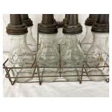 CLOSEUP W/ BOTTLES AND CAPS