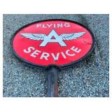 CLOSEUP VIEW FLYING A SERVICE SIGN