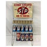 1962 EMB. STP OIL RACK W/ PRODUCT