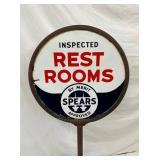 CLOSEUP VIEW RESTROOMS SIGN