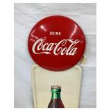 CLOSEUP W/ 16IN COKE BUTTON