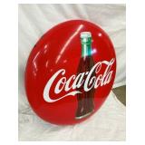 CLOSEUP VIEW COCA COLA BUTTON