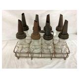 CLOSEUP VIEW OIL CARRIER W/ BOTTLES