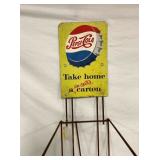CLOSE UP W/PEPSI COLA RACK SIGN