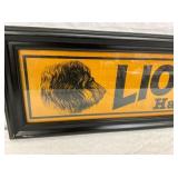 CLOSEUP FRAMED CARDBOARD SIGN