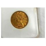 CLOSEUP GOLD LIBERTY HEAD COIN