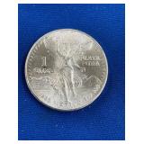 LOT 1560 1985 1 OZ SILVER LIBERTAD