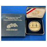 LOT 1702 2010 SILVER DOLLAR VETERANS
