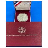 LOT 1713 1988 SILVER OLYMPIC COIN
