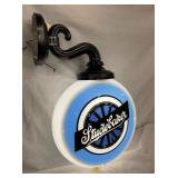 GLOBE W/ BRACKET MEASURES 25IN. 