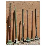 VARIOUS EARLY SIGN POLES W/ BASES