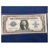 LOT 565 1923 $1 BLUE SEAL SILVER DOLLAR