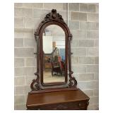 CLOSEUP W/ MIRROR AND CARVINGS