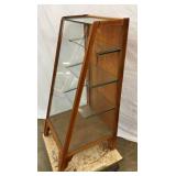 SLANT FRONT W GLASS SHELVES