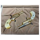 W/ MOTHER OF PEARL GRIPS