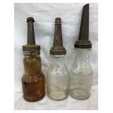 EARLY GLASS OIL BOTTLES