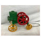 SMALL CAST HIT AND MISS ENGINE TOY
