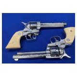 PAIR NICHOLS STALLION 38 CAP PISTOLS