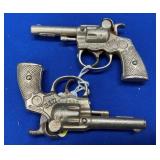 PAIR CAST EXTRA CAP PISTOLS