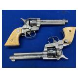 PAIR NICHOLS STALLION 38 CAP PISTOLS