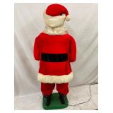 BACKVIEW VIEW OF WORKING SANTA