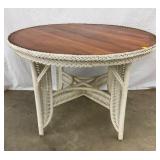 EARLY 42" WICKER TABLE W/ WOOD TOP