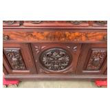 HEAVILY CARVED W/ CHOC. MARBLE