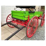 CLOSEUP VIEW WOODEN SPOKE WHEELS