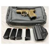 four magazines, a holster,