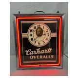Carhartt Overalls Neon Advertising Clock by Neon Products Inc., 15in x 17in