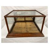 Oak Countertop Showcase with Glass Panels and Sliding Rear Doors