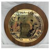 26 1/2″ Metal State of North Carolina Commissioner of Banks Sign on Wood by Morts, Inc.
