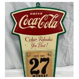Embossed Coca-Cola Fishtail Calendar Plaque, July 1970, 9″ x 14″