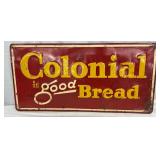 Embossed Metal ‘Colonial Is Good Bread’ Advertising Sign, 27″ x 13.5″