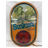Plastic Suncrest Light-Up Clock, 12 x 19 In