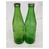 Two Early Green Embossed Mountain Dew 10-Ounce Bottles with Caps