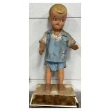 Early Store Display Model of Child in Blue Outfit with Lamb Design