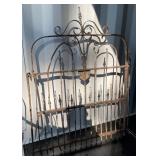 Ornamental Wrought Iron Gate with Scrollwork and Arrow Motifs