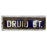 Porcelain ‘Druid St.’ Street Sign with Metal Frame, 20 x 5 1/2 Inches