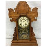 Carved Oak Mantel Clock with Pendulum and Ornate Glass Panel