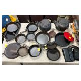 COLLECTION OF CAST IRON PANS 